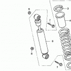 TRX200D Задний амортизатор
