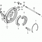 TRX70 Front brake panel @ tie rod